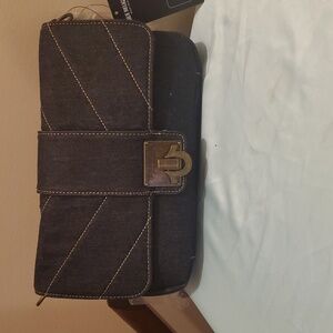 True religion denim handbag dark blue with gold stitching. 11.78w 7.5in h.